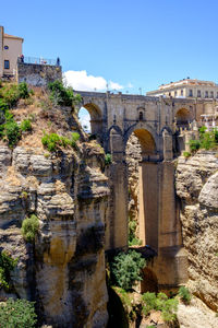 Arch bridge against clear sky