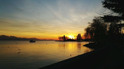 Scenic view of sea at sunset