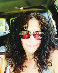 Portrait of woman wearing sunglasses