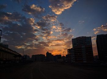 Cityscape against sky during sunset
