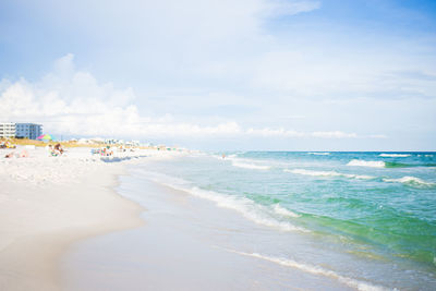 Scenic view of beach against sky