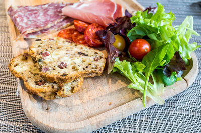 Salami and ham with fresh salad and bread