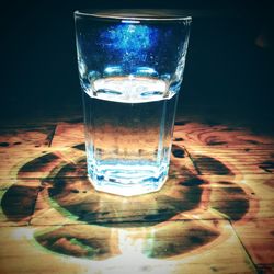 Close-up of glass of water on table