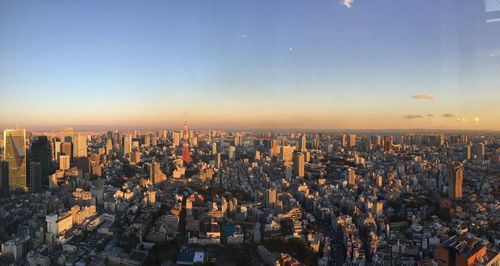 High angle view of city against sky during sunset