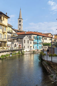 The historic center of omegna with beautiful buildings near the river