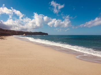 Scenic view of beach against sky