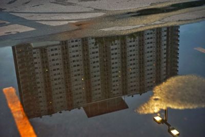 Close-up of buildings against sky in city