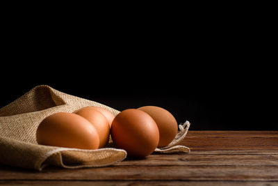 Close-up of eggs against white background