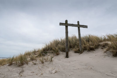 Cross on sand