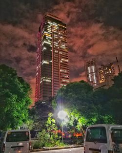 Illuminated city against sky