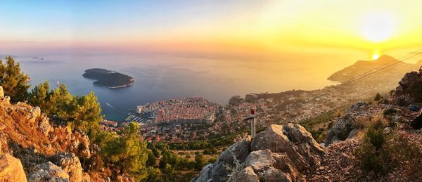 Scenic view of mountains against sky during sunset