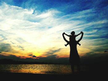 Silhouette of beach at sunset