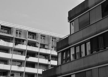 Low angle view of office building against sky