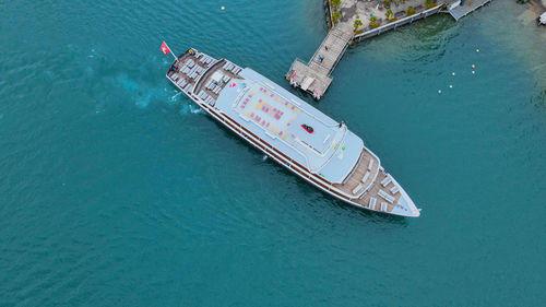 High angle view of ship sailing in sea