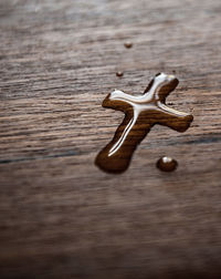 High angle view of a bread on wooden table