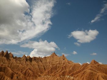 Low angle view of landscape against sky