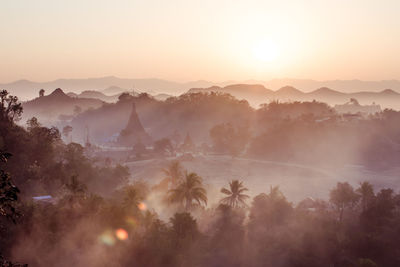 Scenic view of mountains against sky during sunset