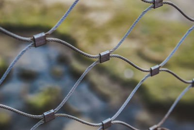 Close-up of barbed wire fence