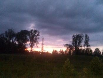 Scenic view of landscape against cloudy sky