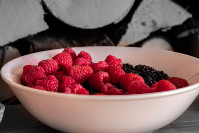 High angle view of strawberries in bowl on table