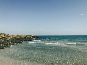 Scenic view of sea against clear sky