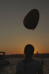 Portrait of silhouette man against sky during sunset