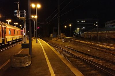 Railroad station platform at night