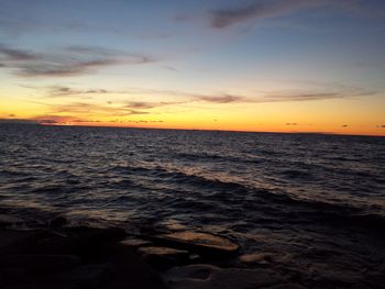 Scenic view of sunset over sea