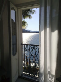 View of sea seen through balcony