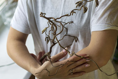 Close-up of hand holding bouquet