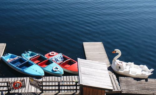 High angle view of boats moored at lake