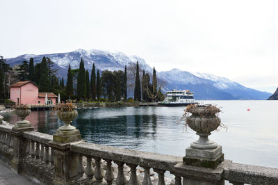 Scenic view of lake against clear sky during winter