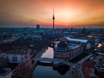 High angle view of city buildings during sunset