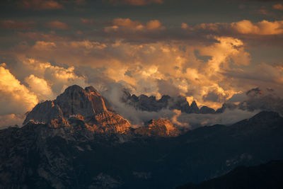 Scenic view of mountains against sky during sunset