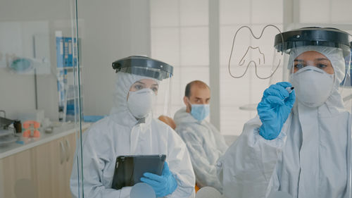 Scientists working at laboratory