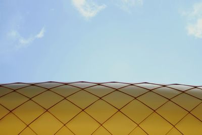 Low angle view of built structure against blue sky