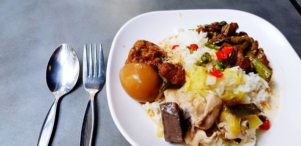 High angle view of breakfast served on table