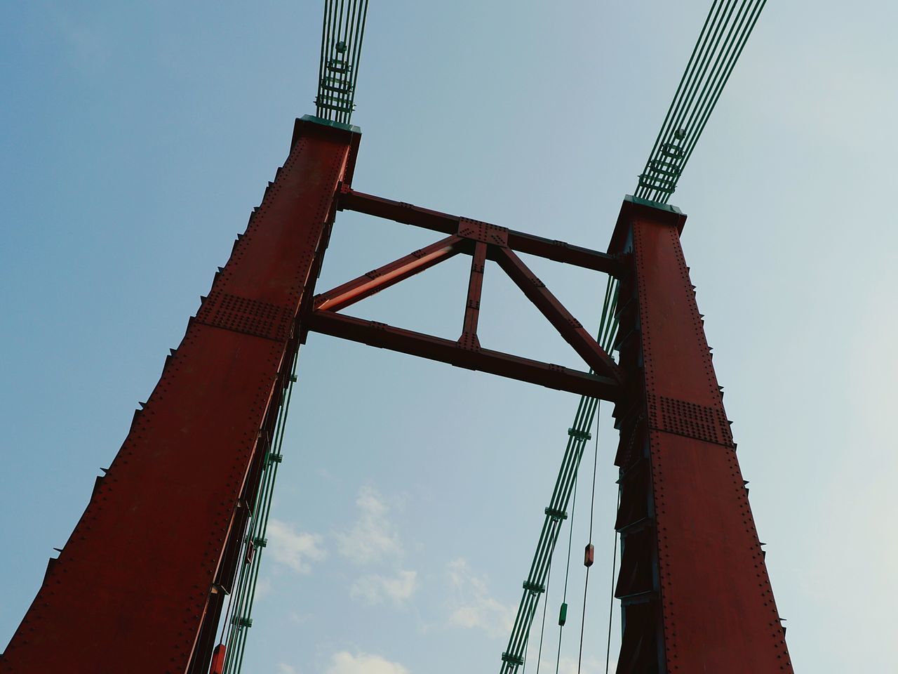 LOW ANGLE VIEW OF CRANE AGAINST CLEAR SKY