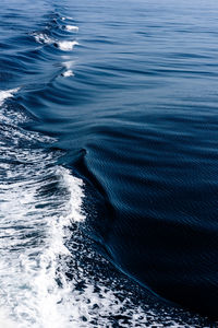 High angle view of water flowing over sea