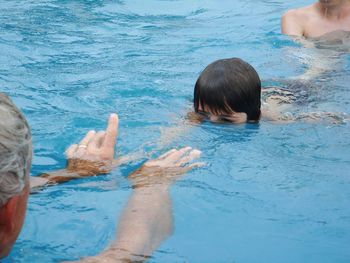 People swimming in pool