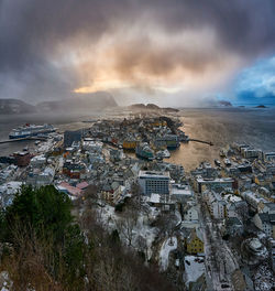 View over Ålesund from aksla mountain during an incoming snowstorm, norway.