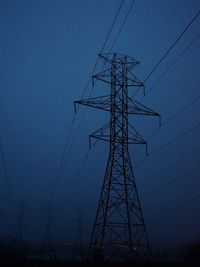 Electricity pylon against sky