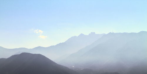 Scenic view of mountains against sky during winter