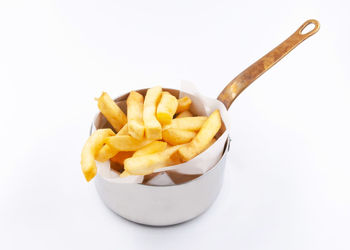 Close-up of burger on plate against white background