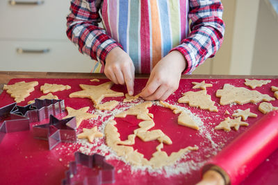 High angle view of hand holding cookies