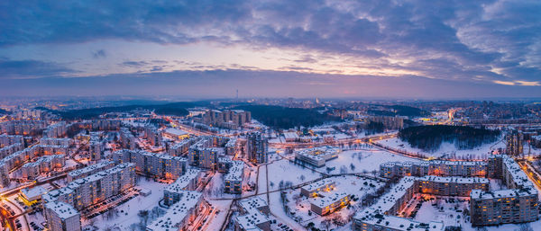 High angle view of city against sky during sunset