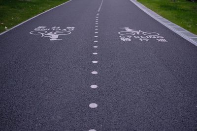 Bicycle lane signs on road