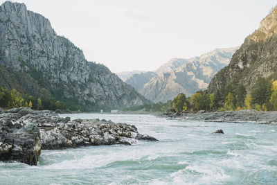 View of the turquoise river katun and altai mountains, autumn season