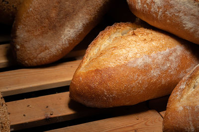 Craft loaves of bread. fresh hot bread from the oven. appetizing and healthy food