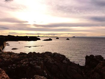 Scenic view of sea against sky during sunset